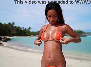 Putri cinta erotic taking the clothes off on a amazing tropical beach